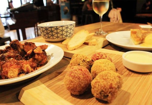 From $15 for Two Heineken's or Wines & Any Snack Item