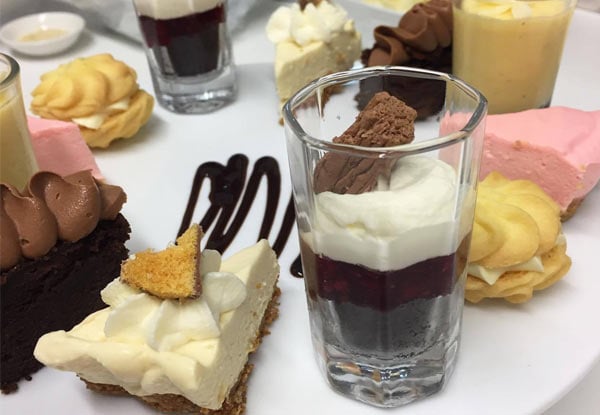 $20 for a Friday Night Dessert Assortment & Two Hot Drinks for Two at NOIR (Petit Fours)