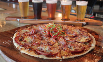 $28 for a Tasting Paddle of Five Craft Beers & One Large Pizza, or $42 for Two Tasting Paddles & a Pizza - Valid Weekends Only (value up to $76)