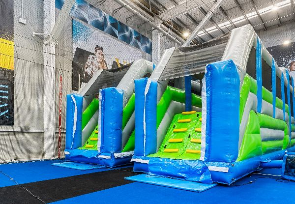 One-Hour Entry to Friday Fun at Inflatable World Incl. One Small Natural Fruit Slushie - Valid Fridays Only