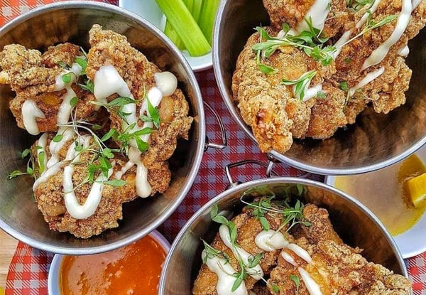 $45 for a Waterfront Dining Experience in Wynyard Quarter with Two Mains & Two Glasses of Wine or Beer – Options for Four People (value up to $188)