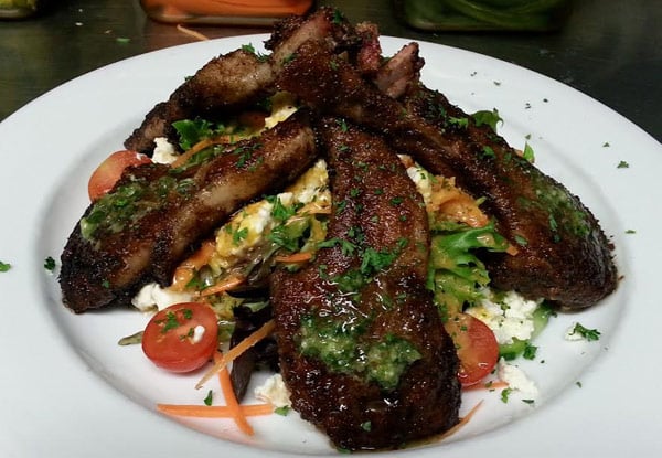 $39 for Two Mains & Two Glasses of House Wine or National Beer for Two People, or $76 for Four People (value up to $176)