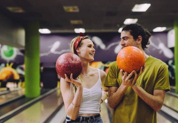 Date Night Delight - Bowling, Golf Simulator, Car Simulator & 30-Minutes of Arcade Fun for Two People - Option for Four People - Valid Seven Days