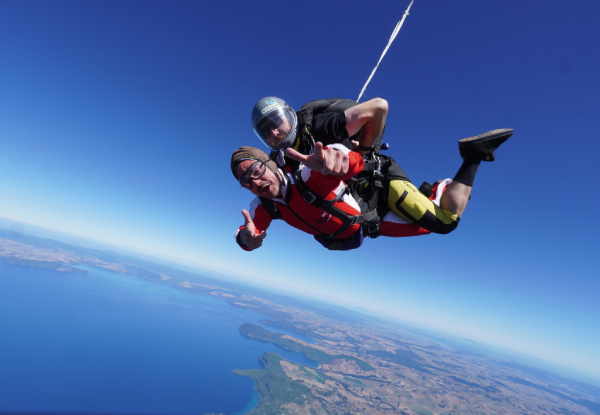 12000-Feet Tandem Skydive Package incl. $40 Voucher Towards a Camera Package or Exit Image - Option for 15000-Feet