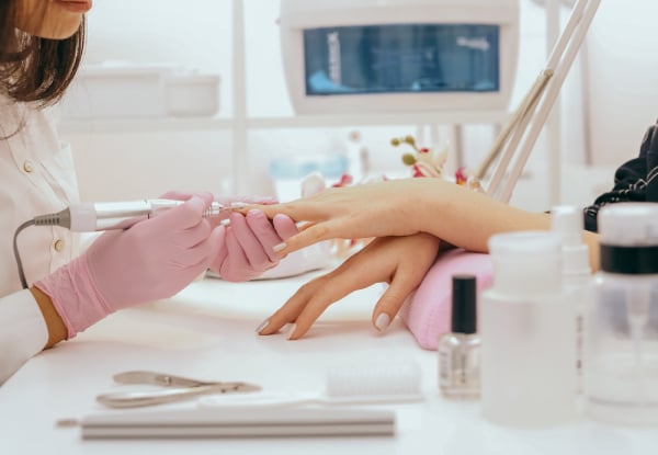 Spring Nail Renewal Service incl. $20 Gift Voucher incl. for One Person - Options for Express Manicure or Pedicure, Signature Gel Manicure or Pedicure, & Deluxe Manicure & Pedicure incl. $20 Gift Voucher - Valid at Two Locations