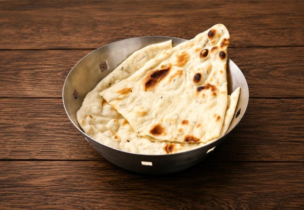 Curry Dinner for Two People incl. Two Curries, Shared Rice, One Naan & One Onion Bhaji — photo 5